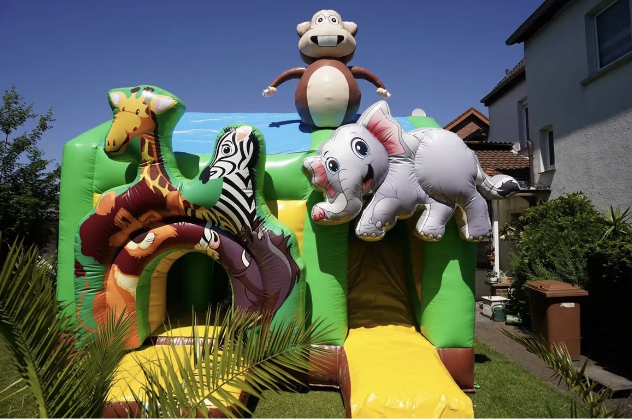Safaripark Hüpfburg mit Giraffe, Zebra, Elefant und Affe